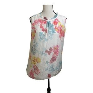 Elena Baldi silk floral blouse. Sleeveless ruffle detail around neckline…
